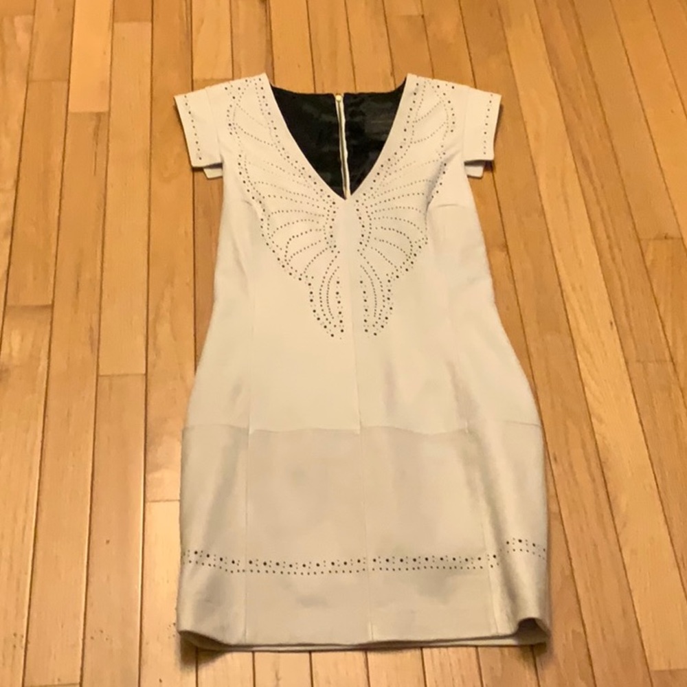 White 100% leather mini dress, perforation detail
